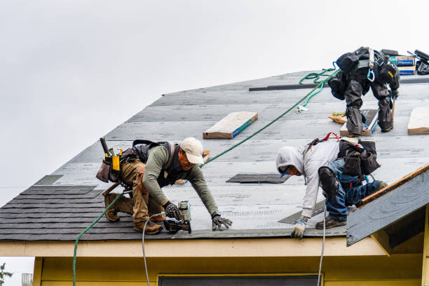 Professional Gutter Installation technician working in Harrisburg, SD